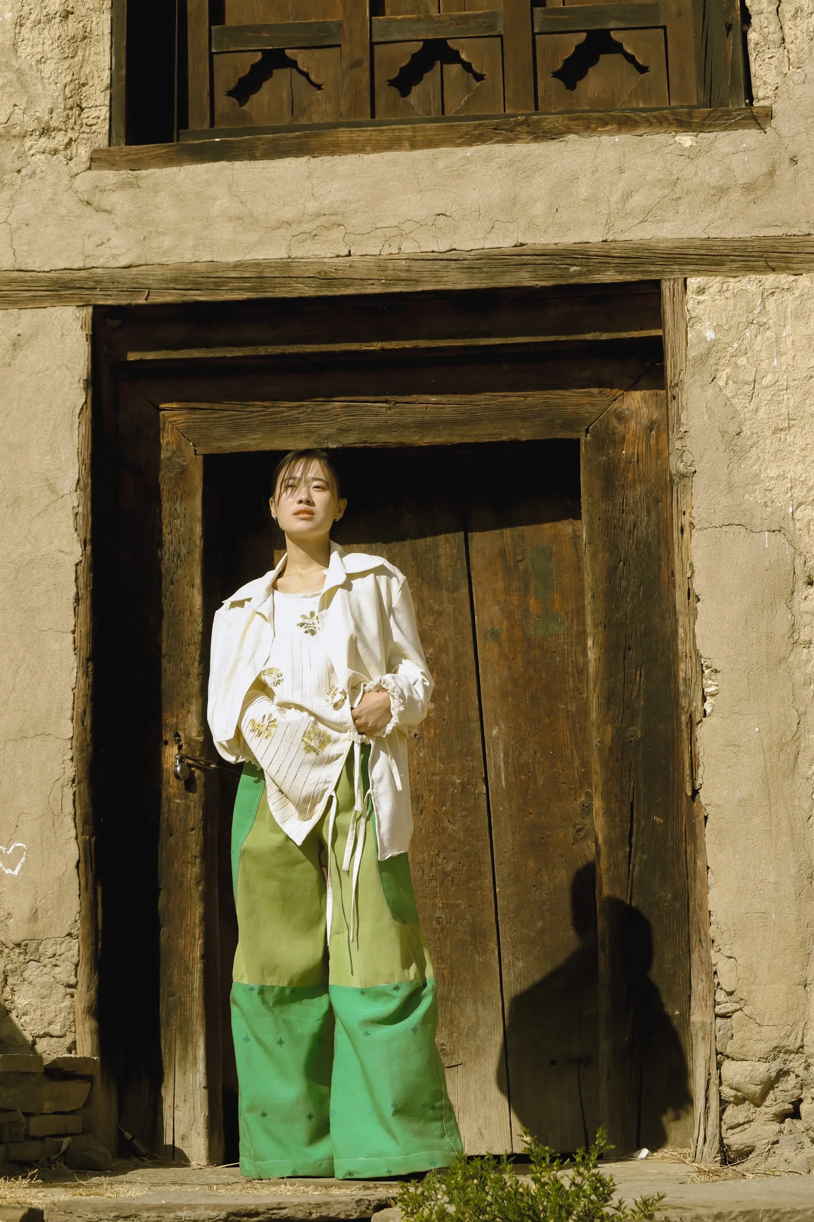 The eco-print look framed by a wooden doorway