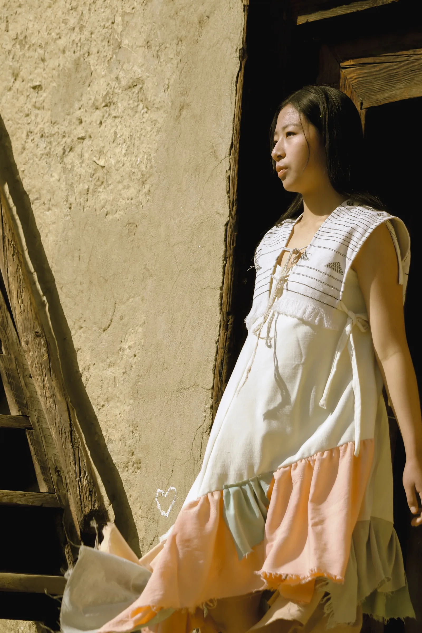 Portrait in the naturally-dyed dress, afternoon light