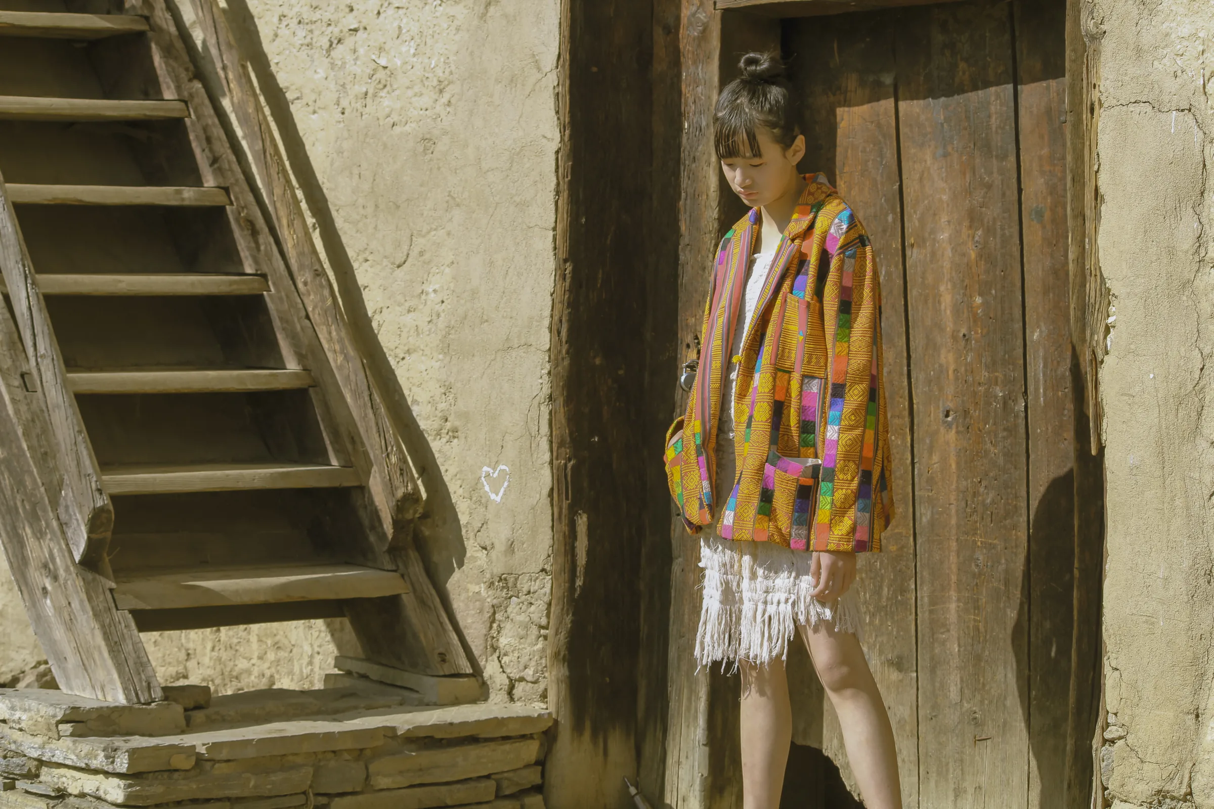 Walking past the wooden stairs in the remade jacket